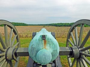 Looking along the barrel of a Civil War-era cannon.