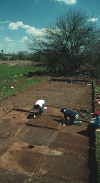 Imposing a three-dimensional horizontal and vertical grid is the only way of establishing spatial control at an archaeological site. All points in a grid are related to a datum, a reference point of assigned horizontal and vertical location. Usually, archaeologists will designate this point with a metal pipe. After the datum point has been established, a physical grid is created over the area of examination with a surveyor's transit. The value of this system is that every point, within the boundaries of the grid, is known in relation to every other point and all artifacts can be recorded in spatial terms. Click on the "Dig Deeper" to see more examples of archaeological sites and select the "Try It!" icon to see if you can imagine what a building looked like from the archaeological footprint.