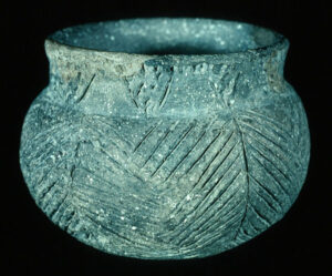 Prehistoric vessel with incisions