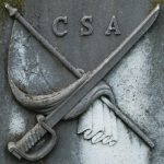 Monuments provided by the family of the deceased may include symbols indicating rank, branch, etc.