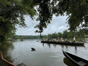 The slender form of the batteau may be seen here in Scottsville, setting out for day six of the James River Batteau Festival.