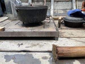 A simple hearth is all that is needed to feed the crew all week. Note the pole tip in the foreground, mushed out from thousands of poundings against the riverbed.