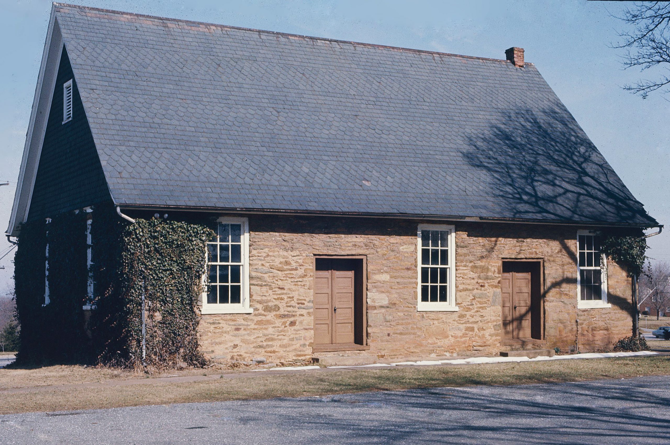 118-0015_Quaker_Meeting_House_1975_Ext_Front_Elevation_VLR_Online-scaled