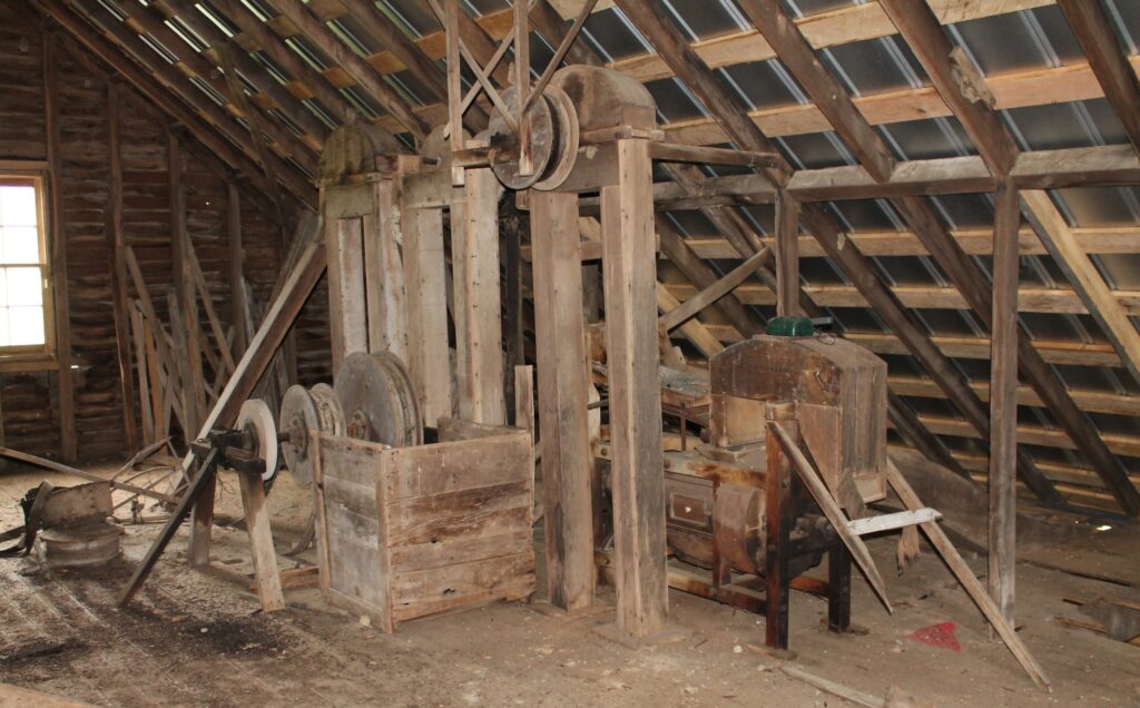 Intact historic milling machinery within the mill’s third floor