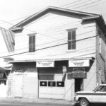 Deering Town Hall in the Town of Deering, Rockingham County, as it appeared in 1986 when it served as an auto parts store and garage.